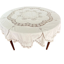 Load image into Gallery viewer, Vintage Embroidered round cutwork tablecloth with scalloped edges. Diameter: 64.5 inches. Handcrafted embroidered round tablecloth. Vintage eyelet embroidered tablecloth. Round cottage core embroidered vintage tablecloth. 
