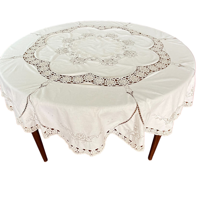 Vintage Embroidered round cutwork tablecloth with scalloped edges. Diameter: 64.5 inches. Handcrafted embroidered round tablecloth. Vintage eyelet embroidered tablecloth. Round cottage core embroidered vintage tablecloth. 