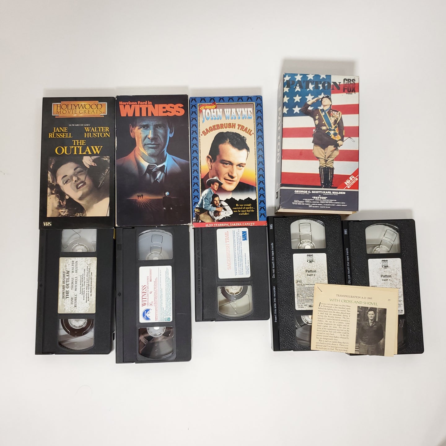 VHS Movies The Outlaw, Witness, Sagebrush Trail, & Patton Lot Sale. The outlaw starring Jane Russell and Walter Huston. Harrison Ford in The Witness, John Wayne in Sagebrush Trail, George C Scott and Karl Malden staring in Patton.  Excellent condition vintage  VHS movies. Vintage entertainment