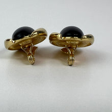 Load image into Gallery viewer, Vintage Monet Black Cabachon Gold Tone Oval Clip on Earrings
