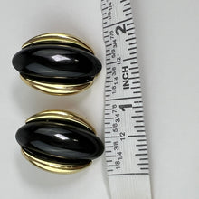 Load image into Gallery viewer, Vintage Monet Black Cabachon Gold Tone Oval Clip on Earrings
