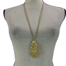Load image into Gallery viewer, Metropolitan Museum of Art Pendant Necklace 24K Electroplated Gold, by Ben Amun. Vintage wearable art by Ben Amun &amp; Metropolitan Museum of Art. Discontinued.
