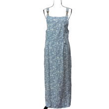 Load image into Gallery viewer, This Vintage Linen Overall Dress Size 14. 100% Linen. Features a 36&quot; waist, adjustable overall straps with interestin silver hardware buckles, a sides zip closure, cinching buttons at the waist, and a single side pocket.  Machine washable. Made in the USA.  Very good vintage conditon. 
