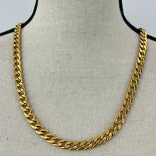 Load image into Gallery viewer, Cuban Link Gold Chain Necklace 23&quot;23&quot; Length x 5/16&quot; width. Gold plated. Marked Stainless Steel.  Excellent pre-owned condition. Unfaded shiny gold tone.
