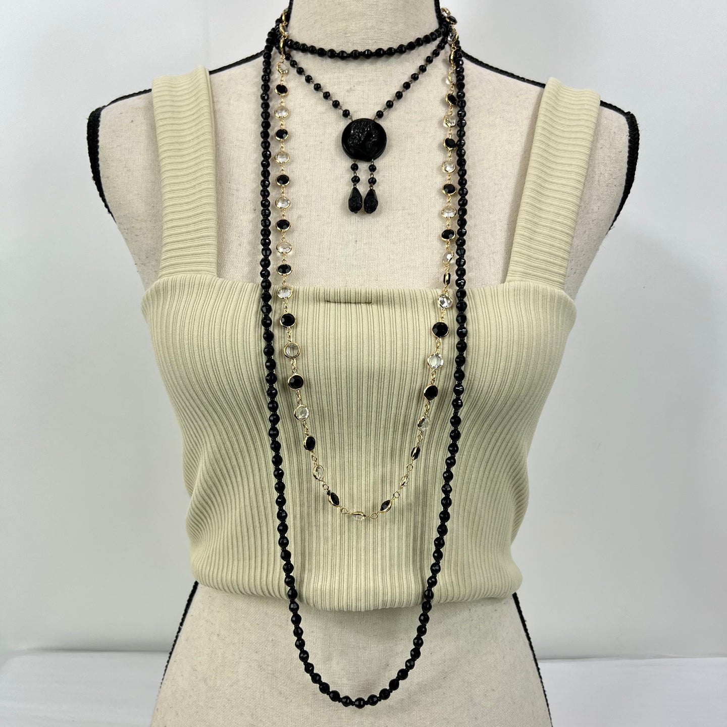  Long black Flapper girl necklace.