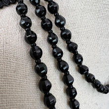 Load image into Gallery viewer, This Victorian Antique Jet Black Faceted Bead Mourning Necklace boasts an extra-long length, perfectly suited to those with a fashionable eye and appreciation for unique jewelry. This necklace can be worn in various. Alone or layered, it makes a statement. 

