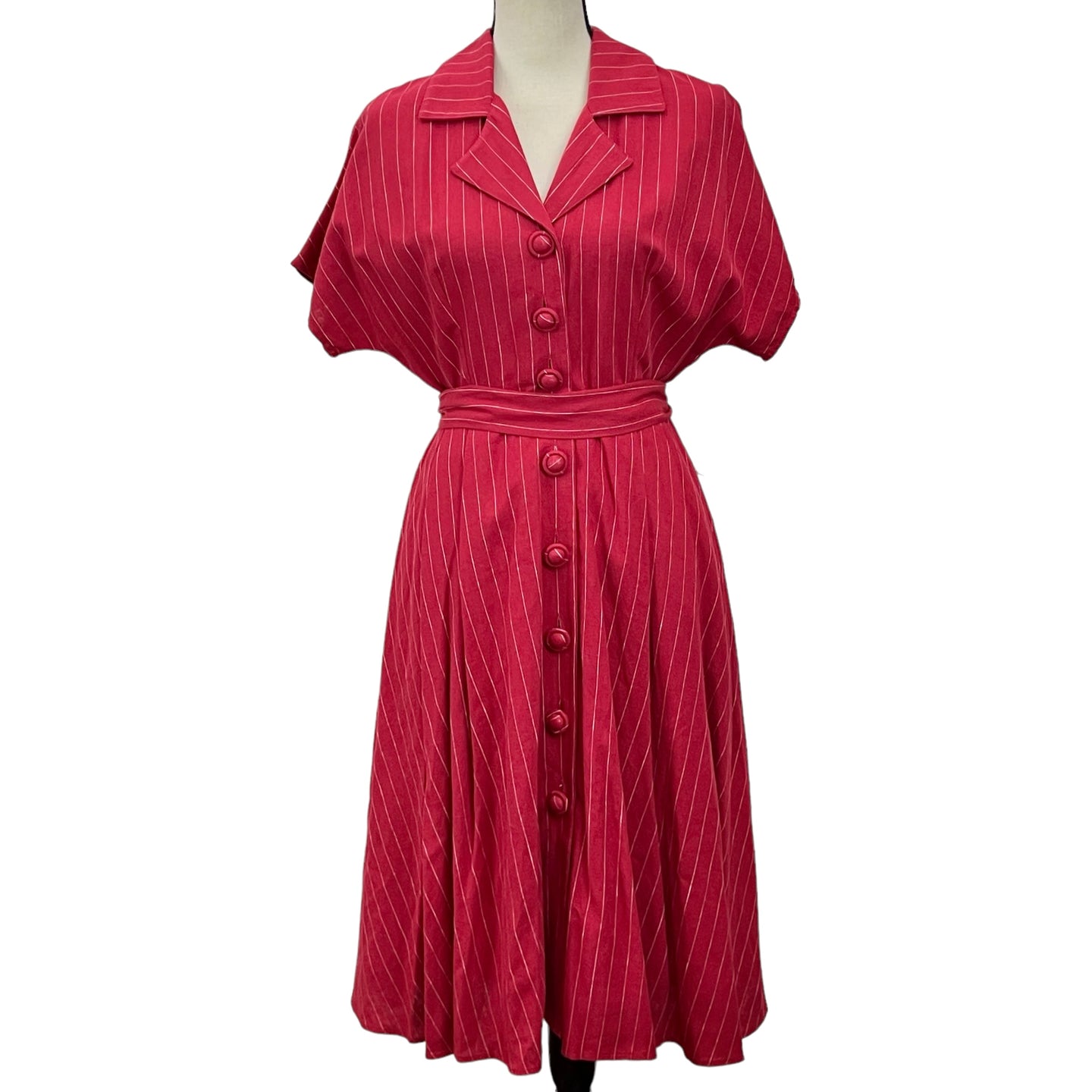 J. Peterman Fit and Flare Red Pinstripe Dress -Size 8. Shell 55% linen 45% viscose, whining 100% cotton. RN 77608. Dry clean only.  Chess 38-39 inches, waist 30 inches, shoulder to hem 43 inches.   Like new condition. 2 spare buttons tag attached.   Processed within 1 business day (not included in shipping carrier’s estimated arrival time). Tracking uploaded immediately upon shipment.